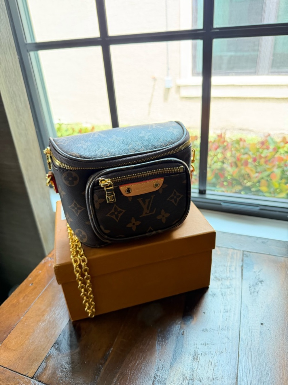 Louis Vuitton Brown Monogram Crossbody Bag with Gold Hardware and Chain
COPY - Picture 2 of 4